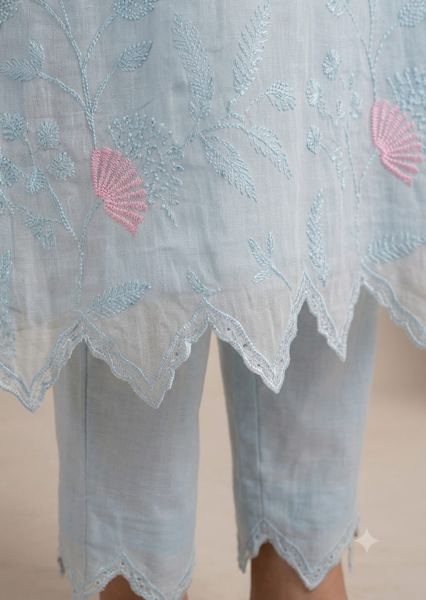 Sheer pastel powder-blue linen or cotton organza. view layout card 4
