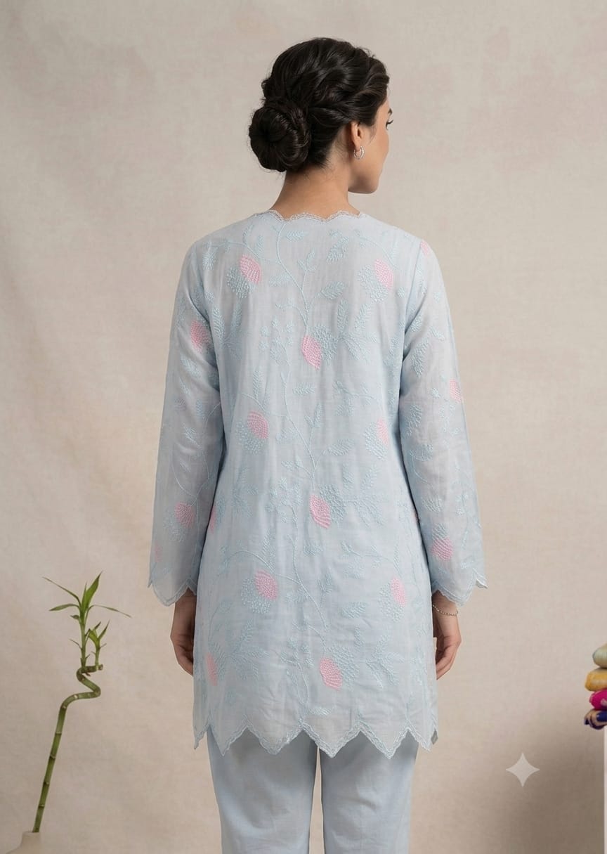 Sheer pastel powder-blue linen or cotton organza. view layout card 3